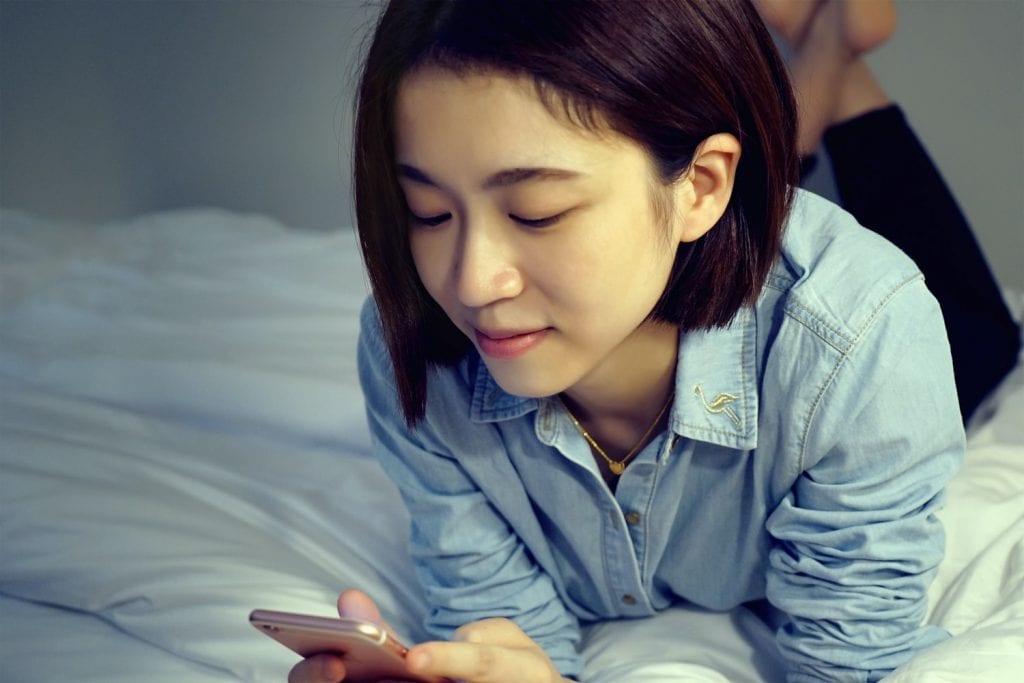 Chinese woman on mobile phone