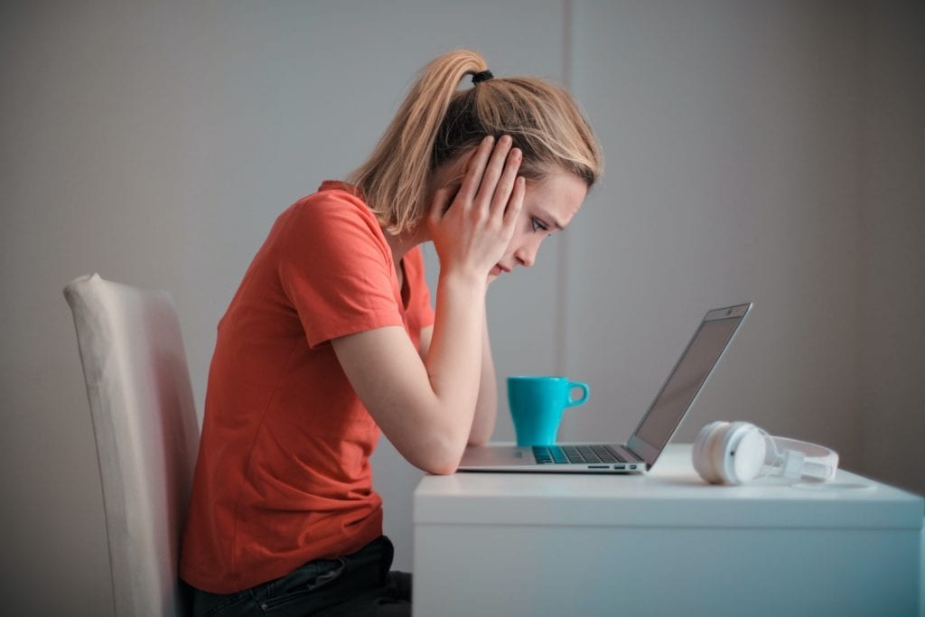 Laptop worried girl